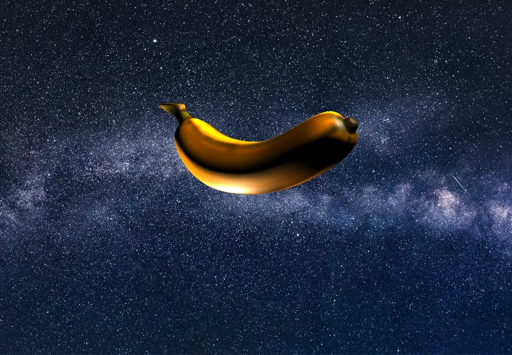 The gold 3D banana floating in a starfield in Banana in Space